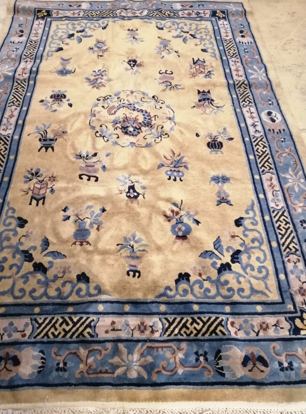 A Chinese yellow ground carpet, 270 x 180cm